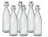 Facetted Clear Glass Bottle with Stainless Steel Shackled Ceramic Closure .500 ml.Set of 6 nos
